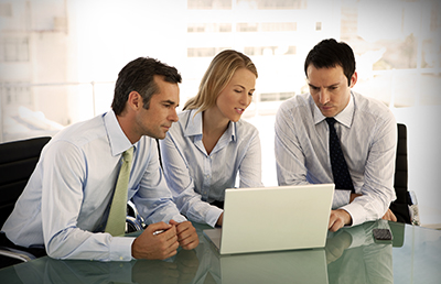 Administrators Review Computer Document