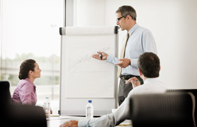 Businessman at Chart Presentation