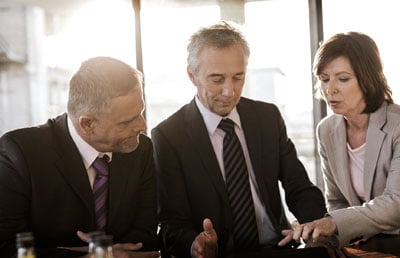 Business Meeting Woman Pointing to Tablet