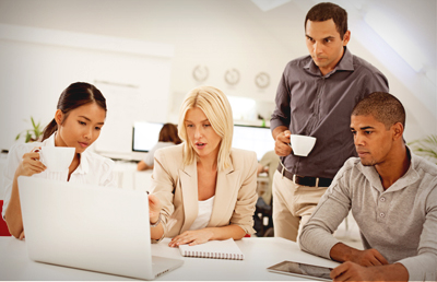Group Looking at Laptop
