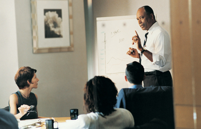 Man Presenting Conference Room