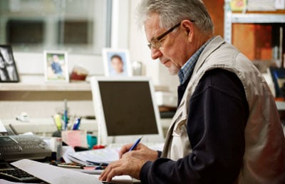 Man Working in a Small Office