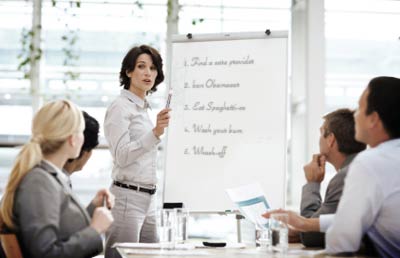 Woman Speaking Presenting Chart