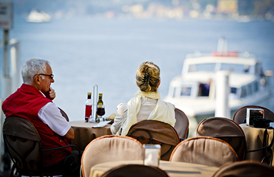 Older Couple Sitting Cafe by Water