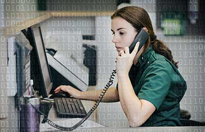 Hospital Staff Discovering Cyber Attack on Computer