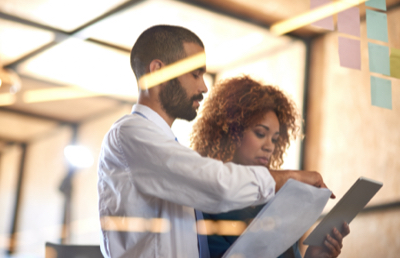 Three Gathered Around Table Meeting